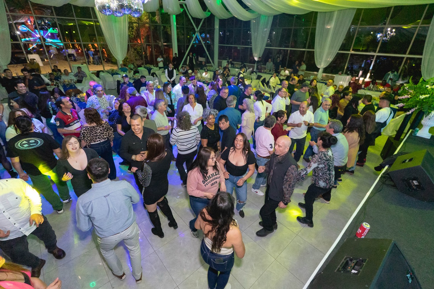 Fiesta del Sindicato de Arcor producida por Productora JAIA — invitados bailando en la pista